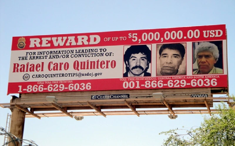 A billboard shows the reward of up to $5,000,000 on Rafael Caro Quintero