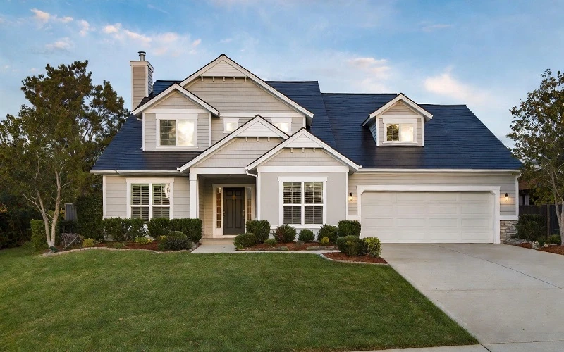 Modern home with strong curb appeal showing home improvements that increase property value